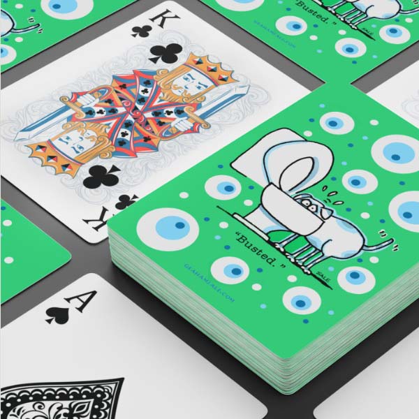 busted dog drinking from toilet playing cards